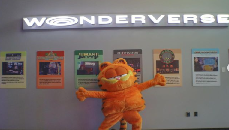 Garfield Mascot Character in front of "Wonderverse" sign